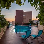 Апартаменты Three Bedroom With Sea View And Pool Aside *